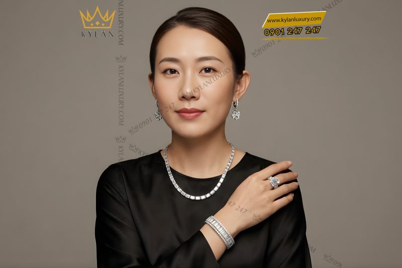 Lắc tay vàng trắng Au750 đính kim cương baguette