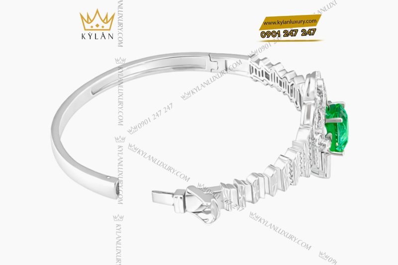 Lắc tay vàng trắng Au750 đính kim cương và đá ngọc lục bảo