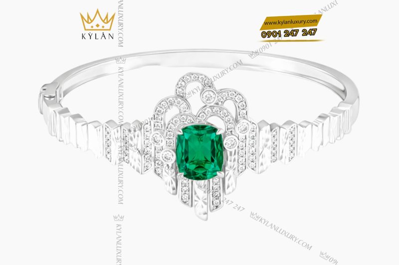 Lắc tay vàng trắng Au750 đính kim cương và đá ngọc lục bảo