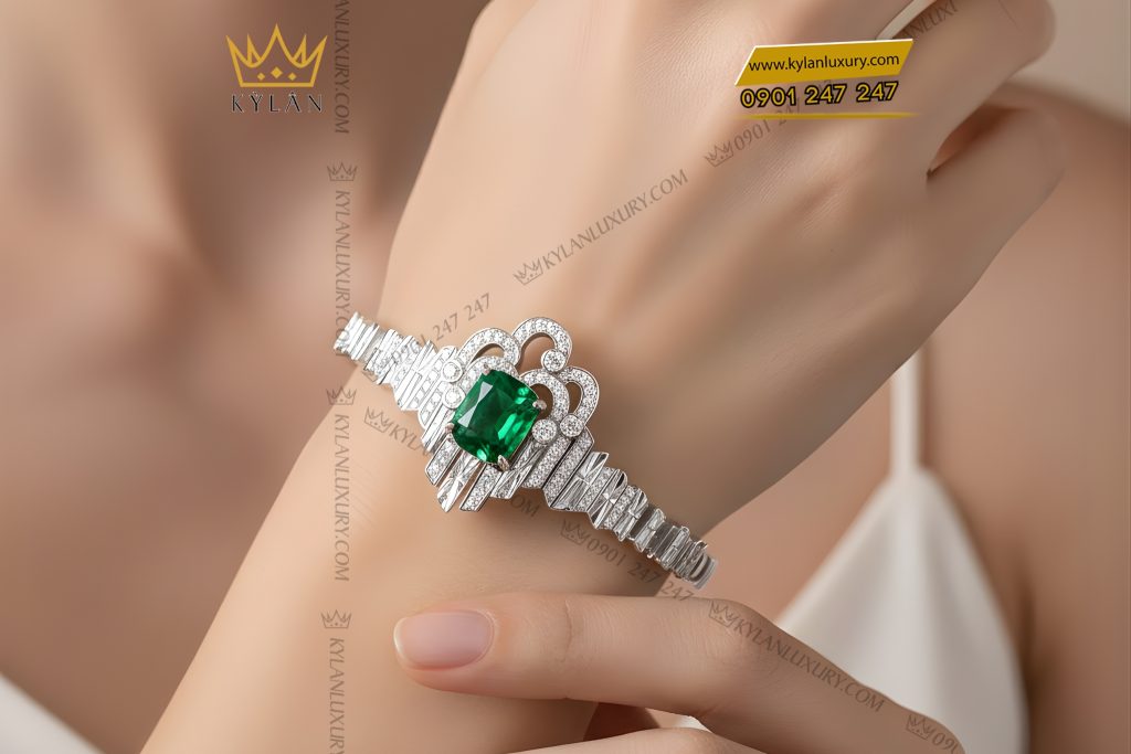Lắc tay vàng trắng Au750 đính kim cương và đá ngọc lục bảo