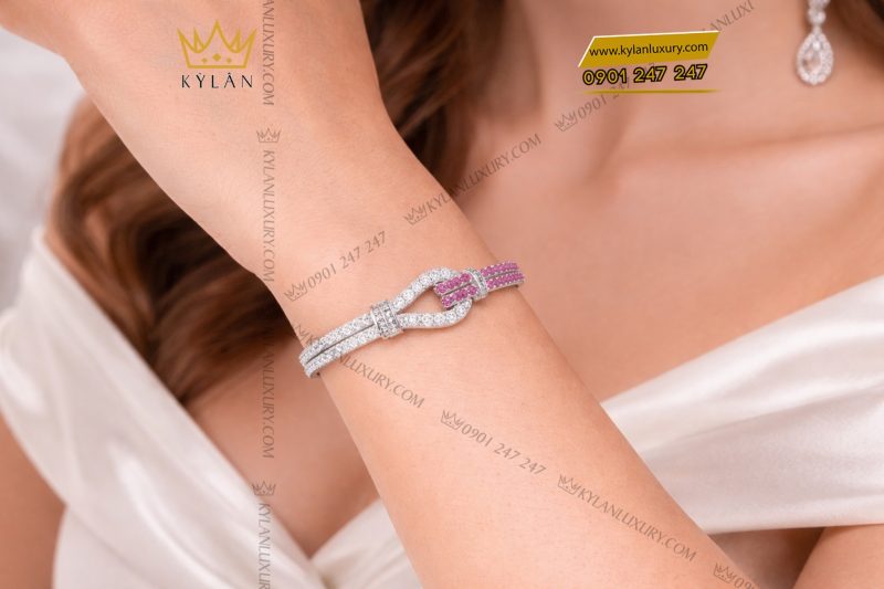 Lắc tay vàng trắng Au750 đính kim cương và đá quý hồng