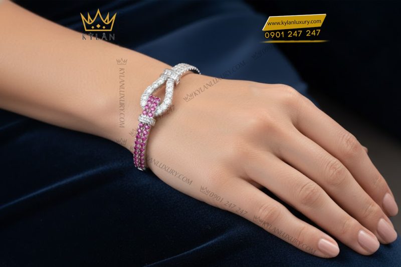 Lắc tay vàng trắng Au750 đính kim cương và đá quý hồng