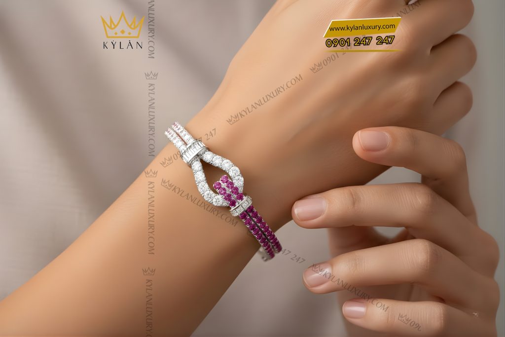 Lắc tay vàng trắng Au750 đính kim cương và đá quý hồng