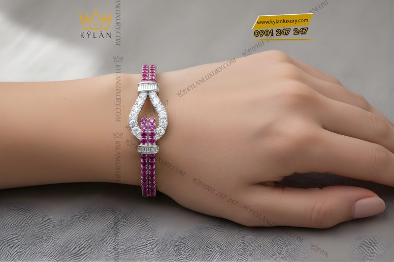 Lắc tay vàng trắng Au750 đính kim cương và đá quý hồng