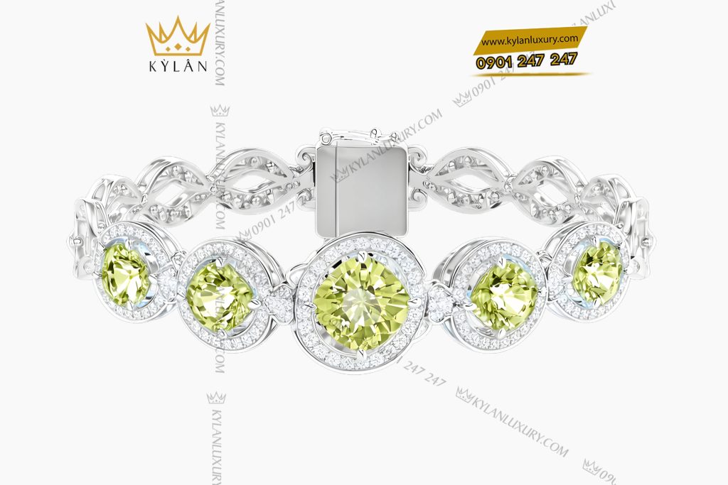 Lắc tay vàng trắng Au750 đính kim cương và đá quý xanh 