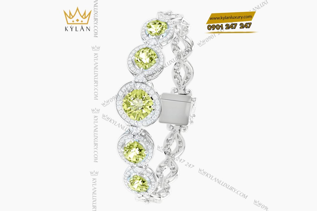 Lắc tay vàng trắng Au750 đính kim cương và đá quý xanh 