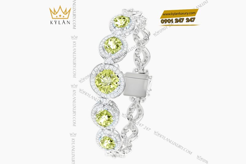 Lắc tay vàng trắng Au750 đính kim cương và đá quý xanh 