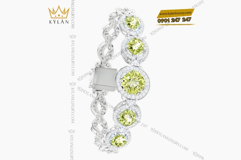 Lắc tay vàng trắng Au750 đính kim cương và đá quý xanh 