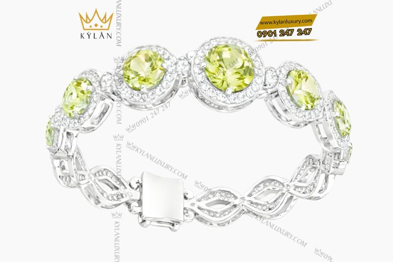 Lắc tay vàng trắng Au750 đính kim cương và đá quý xanh 