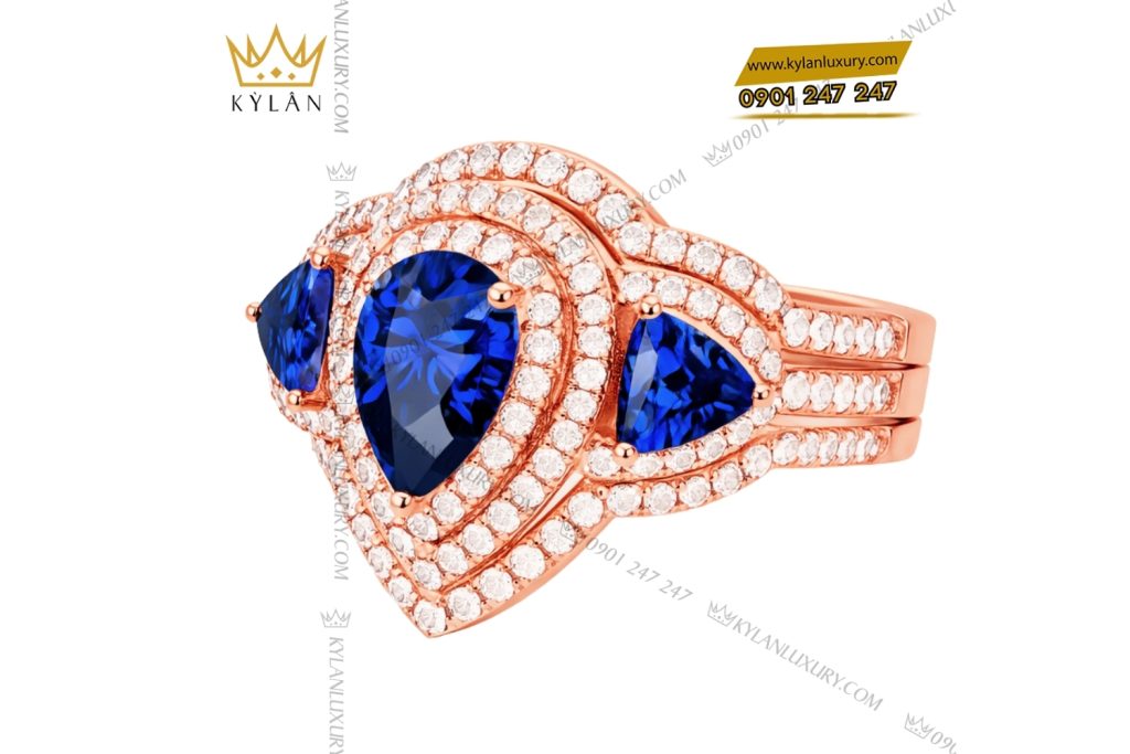 Nhẫn nữ vàng hồng Au750 đính kim cương và đá quý xanh