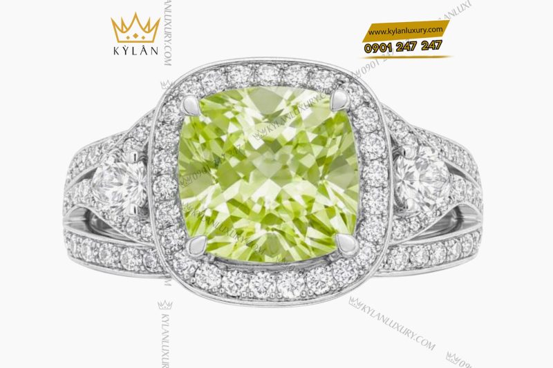 Nhẫn nữ vàng trắng Au750 đính kim cương và đá quý xanh