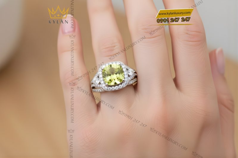 Nhẫn nữ vàng trắng Au750 đính kim cương và đá quý xanh