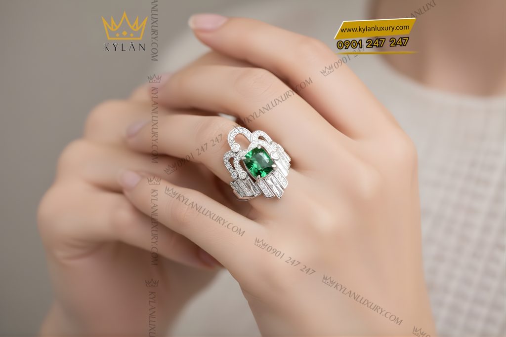 Nhẫn vàng trắng Au750 đính kim cương và đá ngọc lục bảo