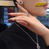 Bông tai vàng hồng Au750 đính kim cương và đá sapphire xanh