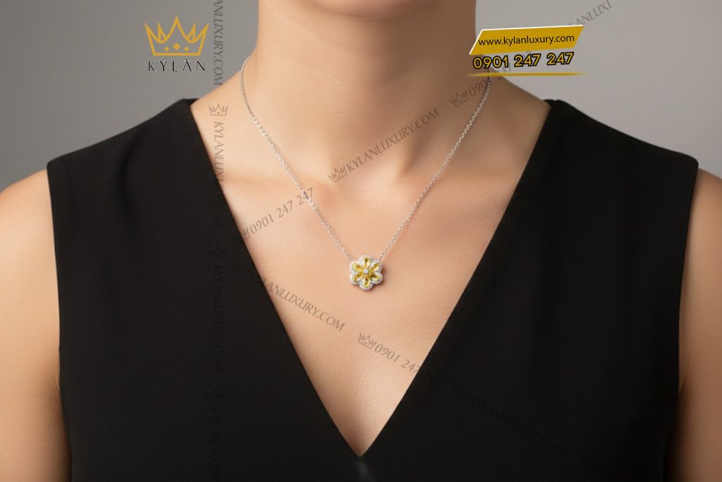 Dây chuyền vàng trắng Au750 đính kim cương và đá quý vàng