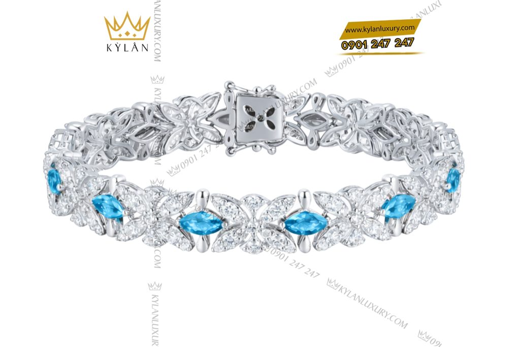 Lắc tay vàng trắng Au750 đính kim cương và đá Topaz