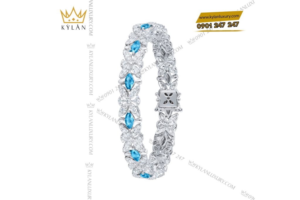 Lắc tay vàng trắng Au750 đính kim cương và đá Topaz
