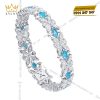 Lắc tay vàng trắng Au750 đính kim cương và đá Topaz