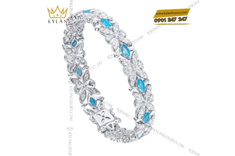 Lắc tay vàng trắng Au750 đính kim cương và đá Topaz