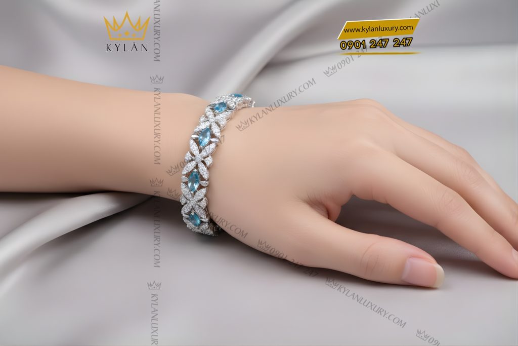 Kỳ Lân Luxury Lac tay vang trang Au750 dinh kim cuong va da Topaz 7 1 Lắc tay vàng trắng Au750 đính kim cương và đá Topaz
