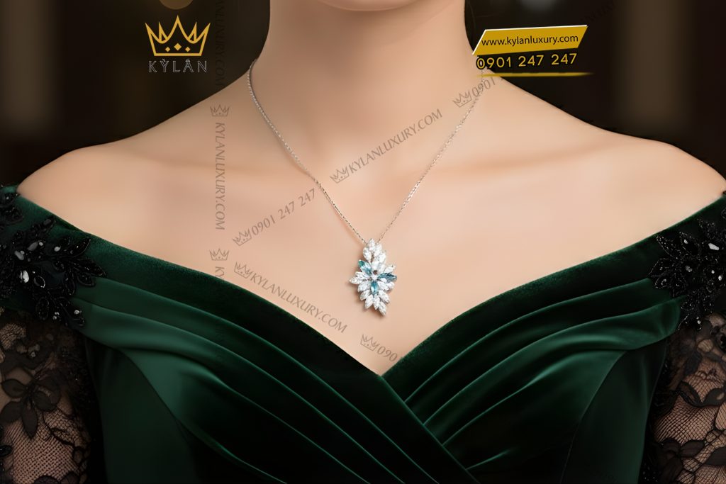 Mặt dây chuyền vàng trắng Au750 đính kim cương và đá Topaz