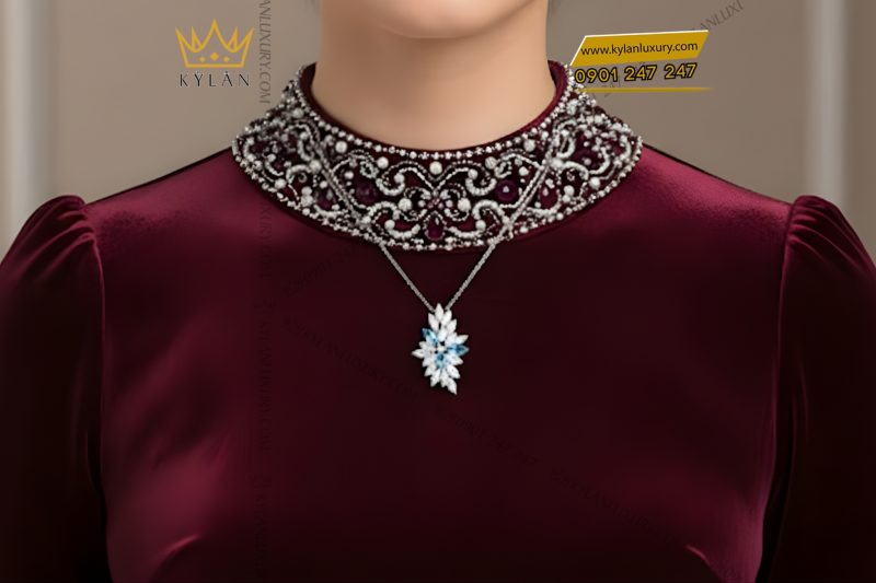 Mặt dây chuyền vàng trắng Au750 đính kim cương và đá Topaz