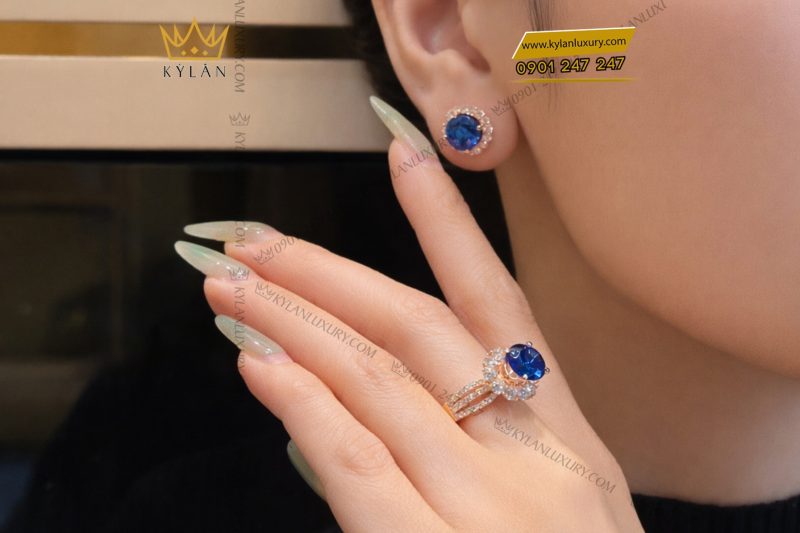 Nhẫn nữ vàng hồng Au750 đính kim cương và đá sapphire xanh