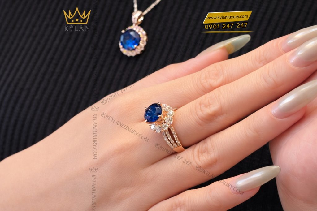 Nhẫn nữ vàng hồng Au750 đính kim cương và đá sapphire xanh
