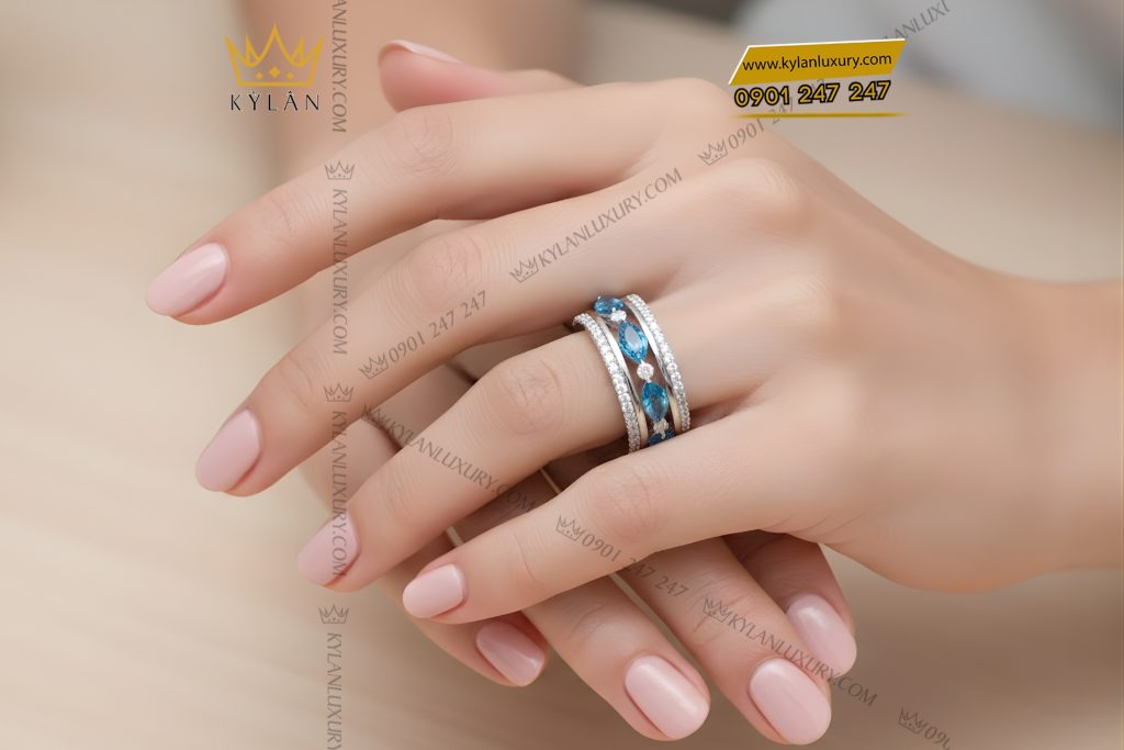 Nhẫn nữ vàng trắng Au750 đính kim cương và đá Topaz