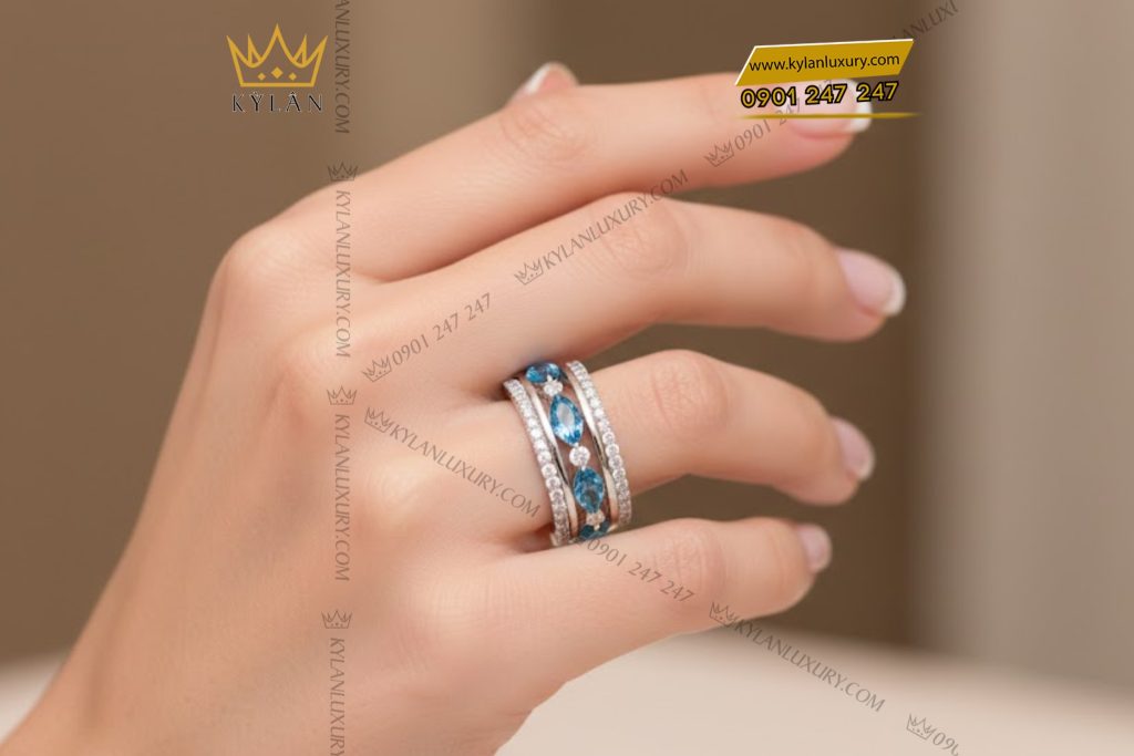 Nhẫn nữ vàng trắng Au750 đính kim cương và đá Topaz