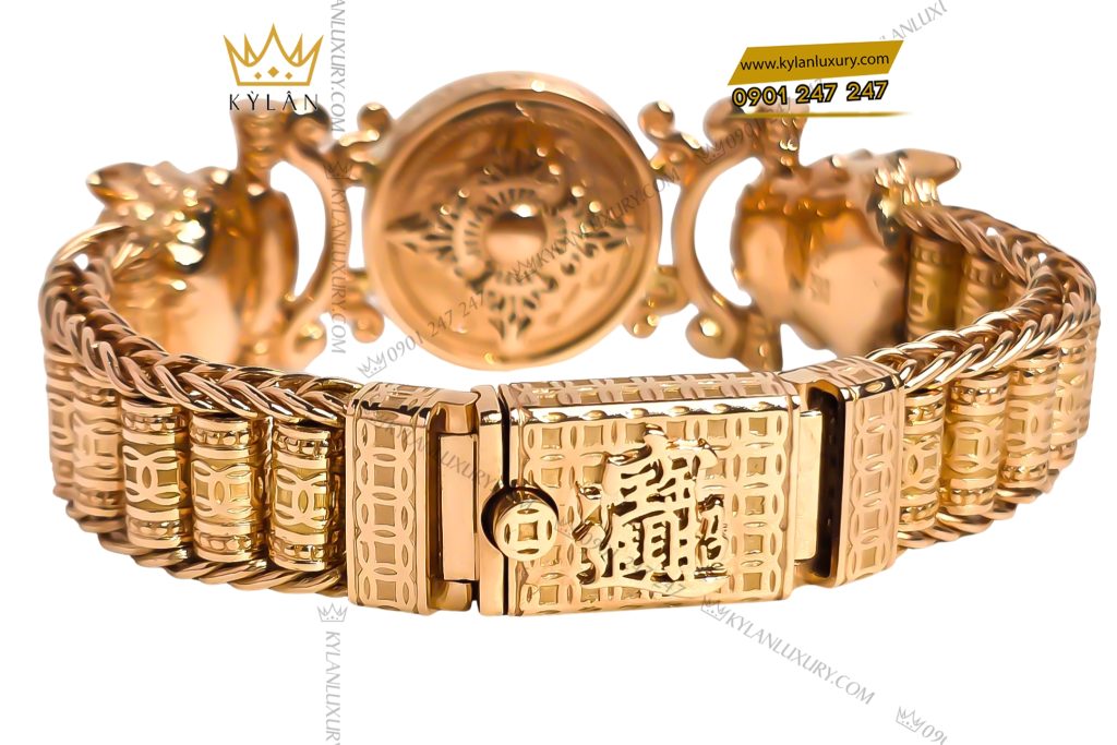 Lắc tay vàng hồng Au750 đính kim cương và ngọc lục bảo