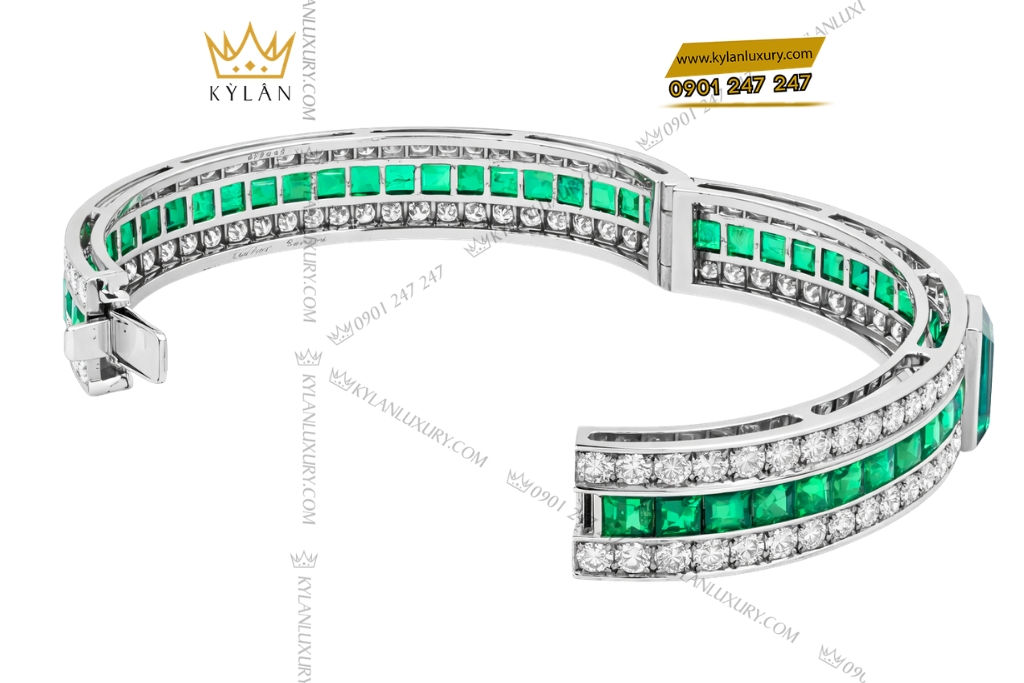 Lắc tay vàng trắng Au750 đính kim cương và ngọc lục bảo