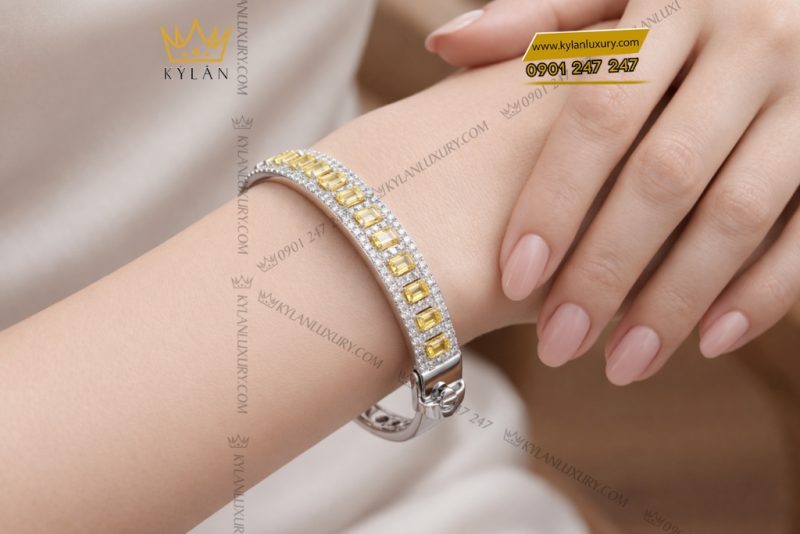 Vòng tay vàng trắng Au750 đính kim cương và sapphire vàng