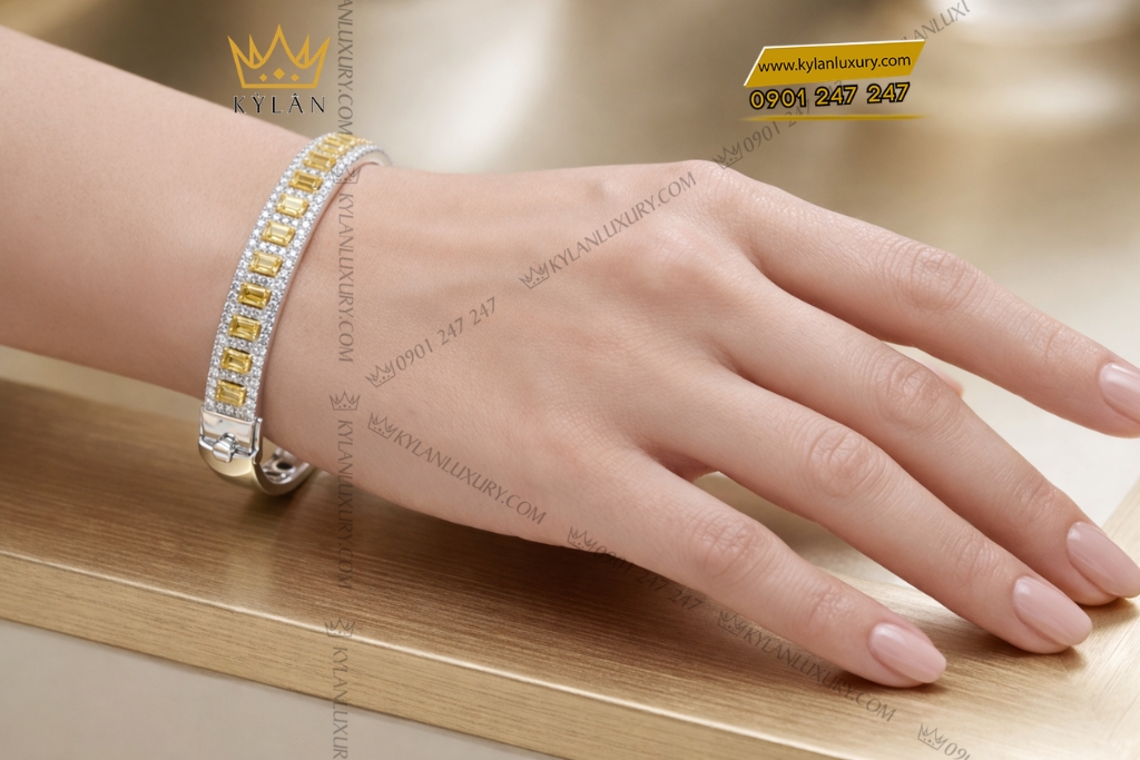 Vòng tay vàng trắng Au750 đính kim cương và sapphire vàng