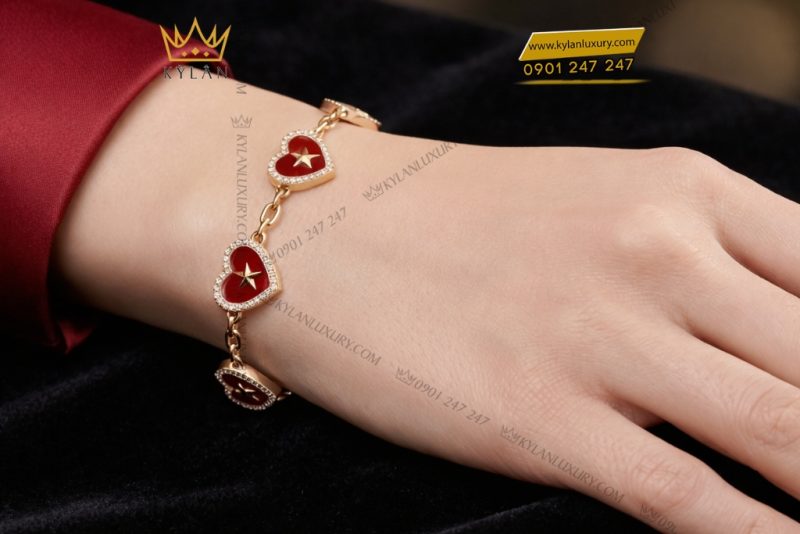 Lắc tay trái tim đính ngôi sao vàng Au750 và kim cương
