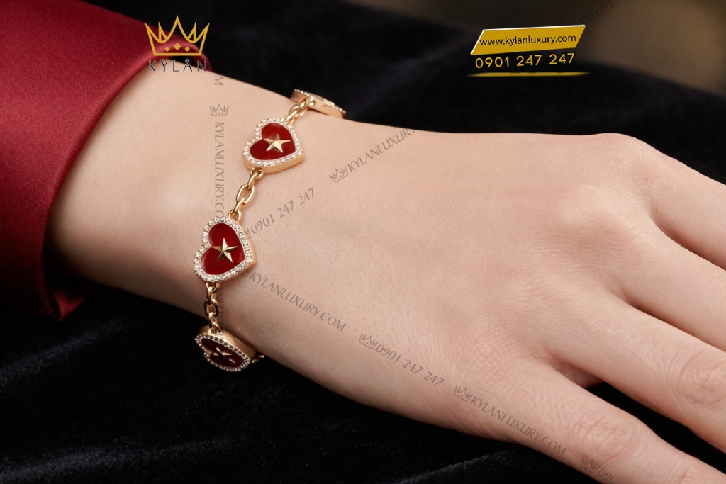 Lắc tay trái tim đính ngôi sao vàng Au750 và kim cương
