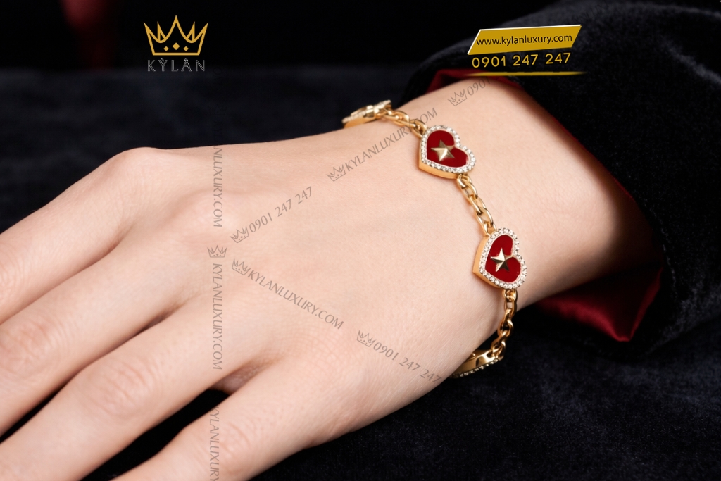 Kỳ Lân Luxury Lac tay trai tim dinh ngoi sao vang Au750 va kim cuong 7 Lắc tay trái tim đính ngôi sao vàng Au750 và kim cương