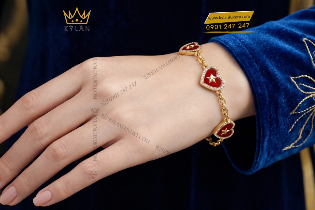 Lắc tay trái tim đính ngôi sao vàng Au750 và kim cương