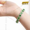 Lắc tay vàng trắng Au750 đính kim cương và đá lục bảo