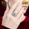 Nhẫn nữ vàng trắng Au750 đính kim cương và đá Topaz xanh