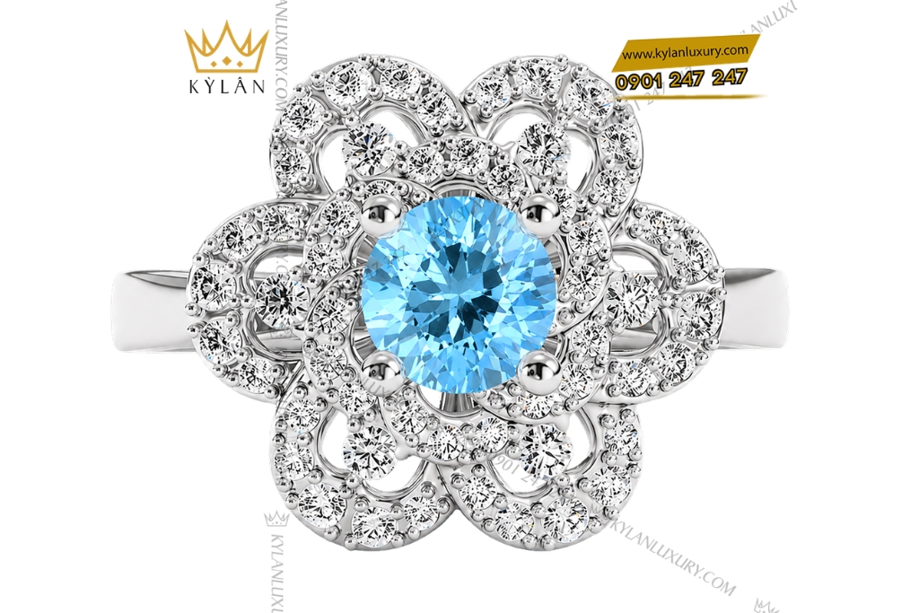 Nhẫn nữ vàng trắng Au750 đính kim cương và đá Topaz xanh