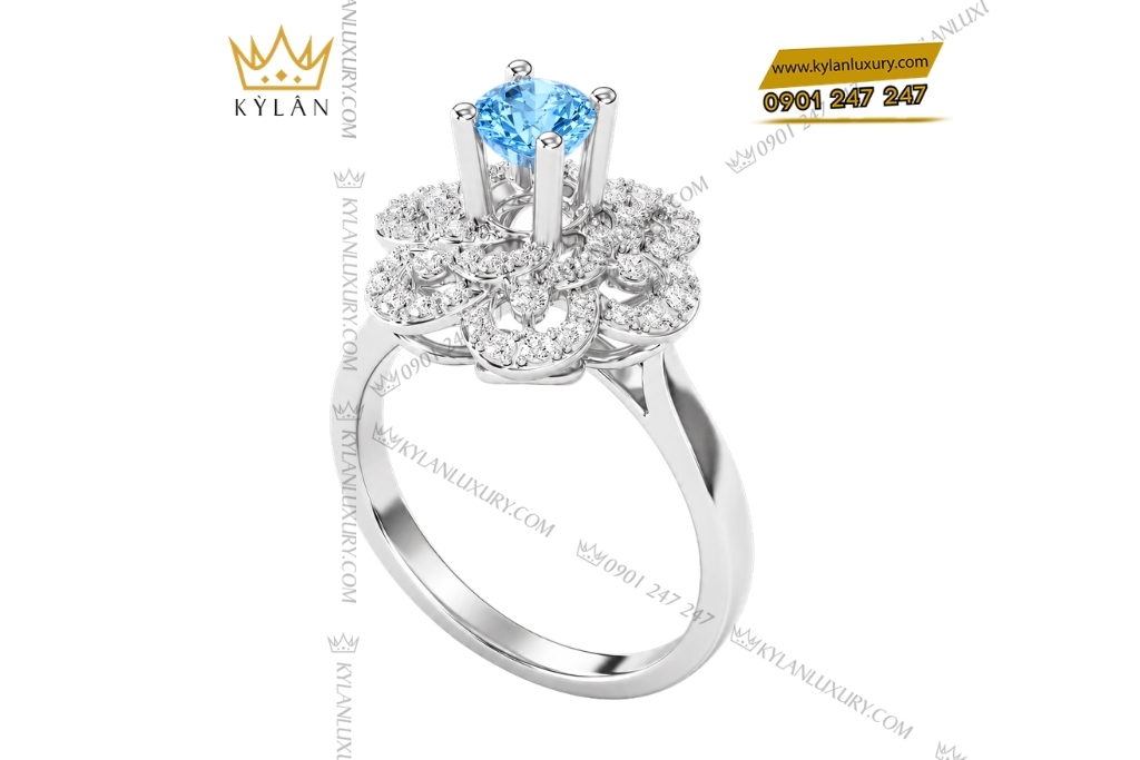 Nhẫn nữ vàng trắng Au750 đính kim cương và đá Topaz xanh