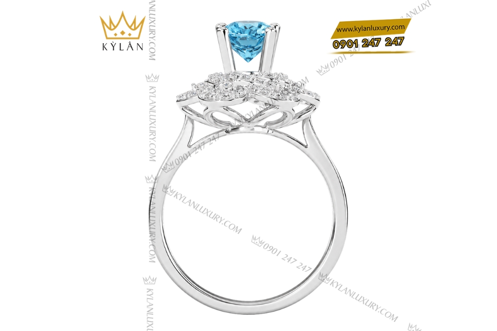 Nhẫn nữ vàng trắng Au750 đính kim cương và đá Topaz xanh