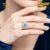 Nhẫn nữ vàng trắng Au750 đính kim cương và đá Topaz xanh