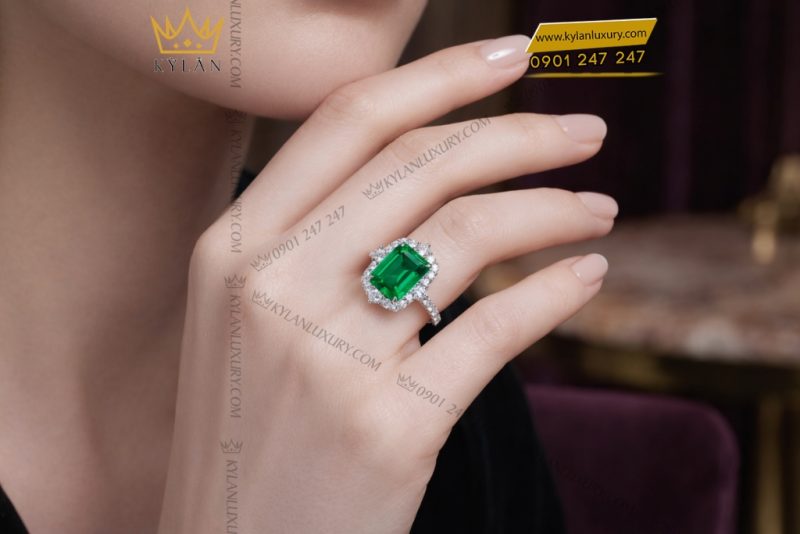 Nhẫn nữ vàng trắng Au750 đính kim cương và đá ngọc lục bảo