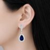 Bông tai vàng trắng Au750 đính kim cương và sapphire xanh dương