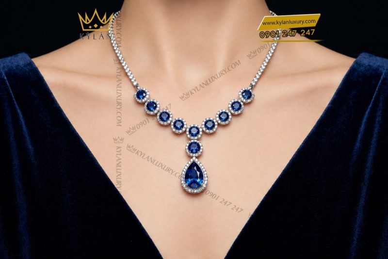 Dây chuyền vàng trắng Au750 đính kim cương và sapphire xanh đậm