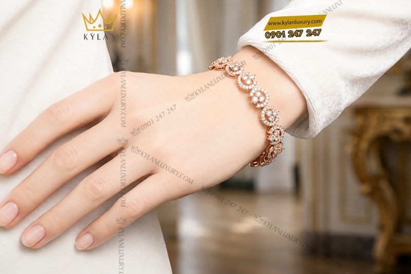 Lắc tay vàng hồng Au750 đính kim cương