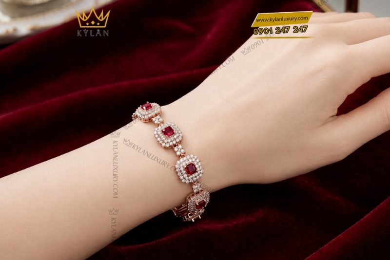 Lắc tay vàng hồng Au750 đính kim cương và sapphire đỏ