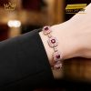 Lắc tay vàng hồng Au750 đính kim cương và sapphire đỏ